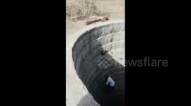 Brave villager goes down 80-foot-deep well to rescue monkey