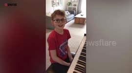 Young musician who is deaf and partially sighted plays both violin and piano