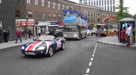 Coventry City FC entering the city with the Playoff cup from Wembley waiting crowds are up the hill ready to cheer there team home  by jim Connor