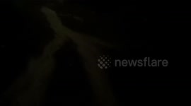 descending from an erupting volcano