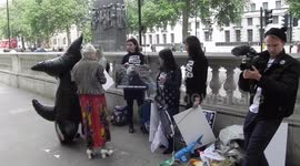 Vivian Westwood and her team getting ready for a protest in downing st against anti fracking in the uk by Jim Connor