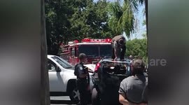 Driver rams vehicle then stomps on its roof in extreme road rage incident