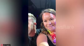 Gary Barlow picks female fan to join him on stage during gig as husband had sign that said “if you pick her I can go to the World Cup'