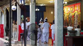 A  Chinese funeral ritual, at a temple in Thailand.