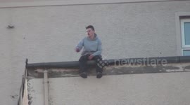 Angry young mans rooftop protest