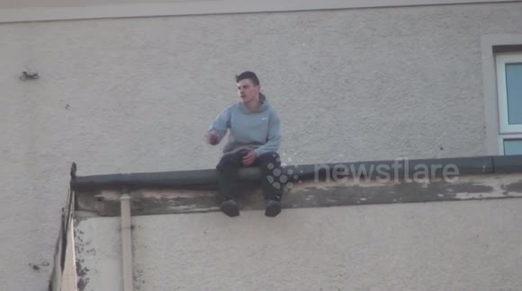 Angry young mans rooftop protest
