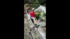 Man slides down waterfall with hilarious commentary