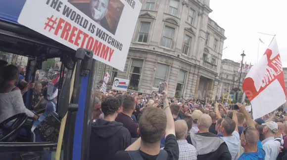 #FreeTommyRobinson protesters let air out sight seeing bus tyres and fight the Police
