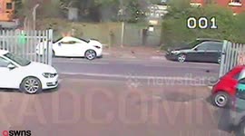 Terrifying footage shows a have-a-go-hero desperately clinging to the bonnet of a getaway car