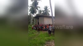 Locals carry home when owner wants to move 50 metres