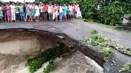 Flooding caused three lost their lives as the road collapsed as the victims tried to cross the road