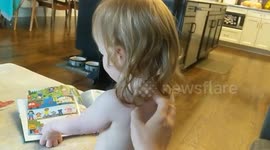 Baby demands back scratches