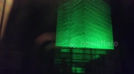 Grenfell Tower lit up green one year on after fire