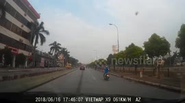 The accident between two motorbikes for carrying a bicycle on the road