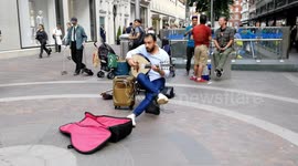 An Arabic musician busking outside Harrods