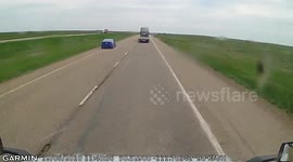 Dashcam captures moment flying mudflap strikes car on Trans-Canada Highway