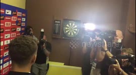 Journalist shows England's Kieran Trippier how it's done at darts