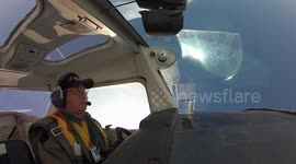 Pilot performs impressive roll in the air without spilling his drink
