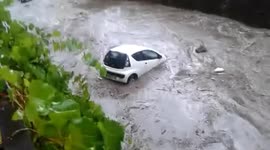 Cars swept away in flash floods in France