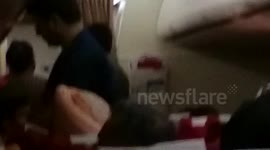 Passengers protesting on Air India flight 315 due to nonfunctional Air-conditioning!