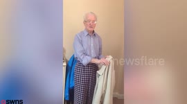 Elderly man's simple solution to helping Parkinson's sufferers put a coat on