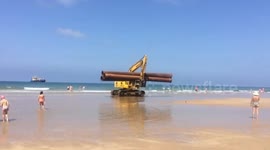 Danger-giants pipes on the beach