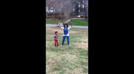 Grandmother Speaking Peace To The World While Exercising With Her Grandson