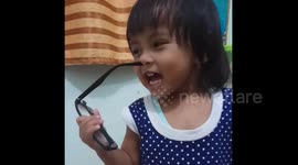 Child's funny sneezing expression