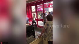 Shopper who allegedly stole bottle of booze returns to the shop for fight