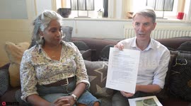 Couple threatening legal action against cops after being banned from LOOKING at neighbour's house