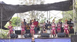 Dancing and singing in the mud, at Yasathorn, rocket festival May 2016.