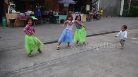 Little kid gets scared when he see's camera and runs away crying.