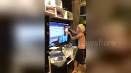 Hairdresser styles Argentina players' hair during national anthem line-up