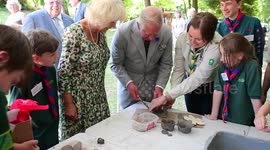 Prince of Wales and Duchess of Cornwall make clay poppies in Monmouthshire