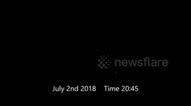 Large orange ball of light in the skies of New Zealand