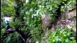 World's most dangerous school run! Kids cross flooded river in a bamboo basket