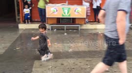 Child playing on the Rain
