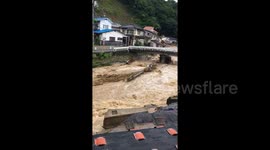 Eyewitness video shows collapsed homes after Japan floods