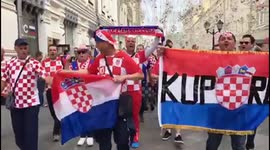 Croatia supporters march through the streets of Moscow ahead of England clash