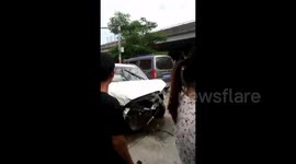 Out-of-control car flies down from seven-metre-high motorway