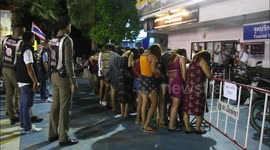 Sixty Thai prostitutes frogmarched to police station in sex trade crackdown