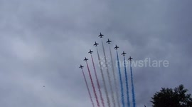 The Red Arrows with smoke on for the !00 years of the RAF air show across London  flying in formation  Fantastic over Trafalgar Square and on down Pall Mall to Buckingham Palace by Jim Connor