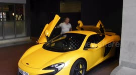 Di and Carol Drive away in there Mclaran  super car from the Soho hotel in London heading back to Cardiff Wales di said he had driven the car up to 161 mph by Jim Connor
