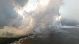 Aerial footage shows massive corrosive seawater plumes as lava hits Hawaii seas