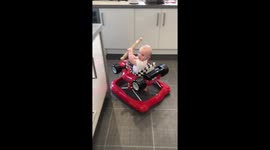 Baby steals rolling pin