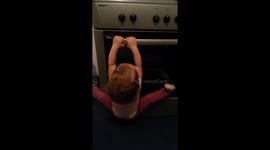 Kids doing gymnastic in the kitchen