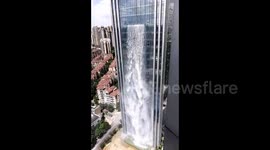 Discover the world’s highest man-made waterfall on a Chinese skyscraper