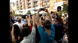 Sir Paul McCartney and wife's car is mobbed by fans when they  leave Abbey Road Studios after Sir Paul  performed an intimate concert for fans and celeb friends