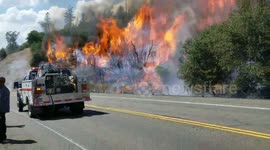 Dramatic footage shows Carr Fire blazing along major highway in northern California