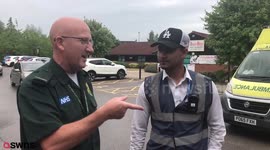 Shocking moment a ticket warden fines an ambulance for parking on double yellows - while they stop for their first drink of water in eight hours